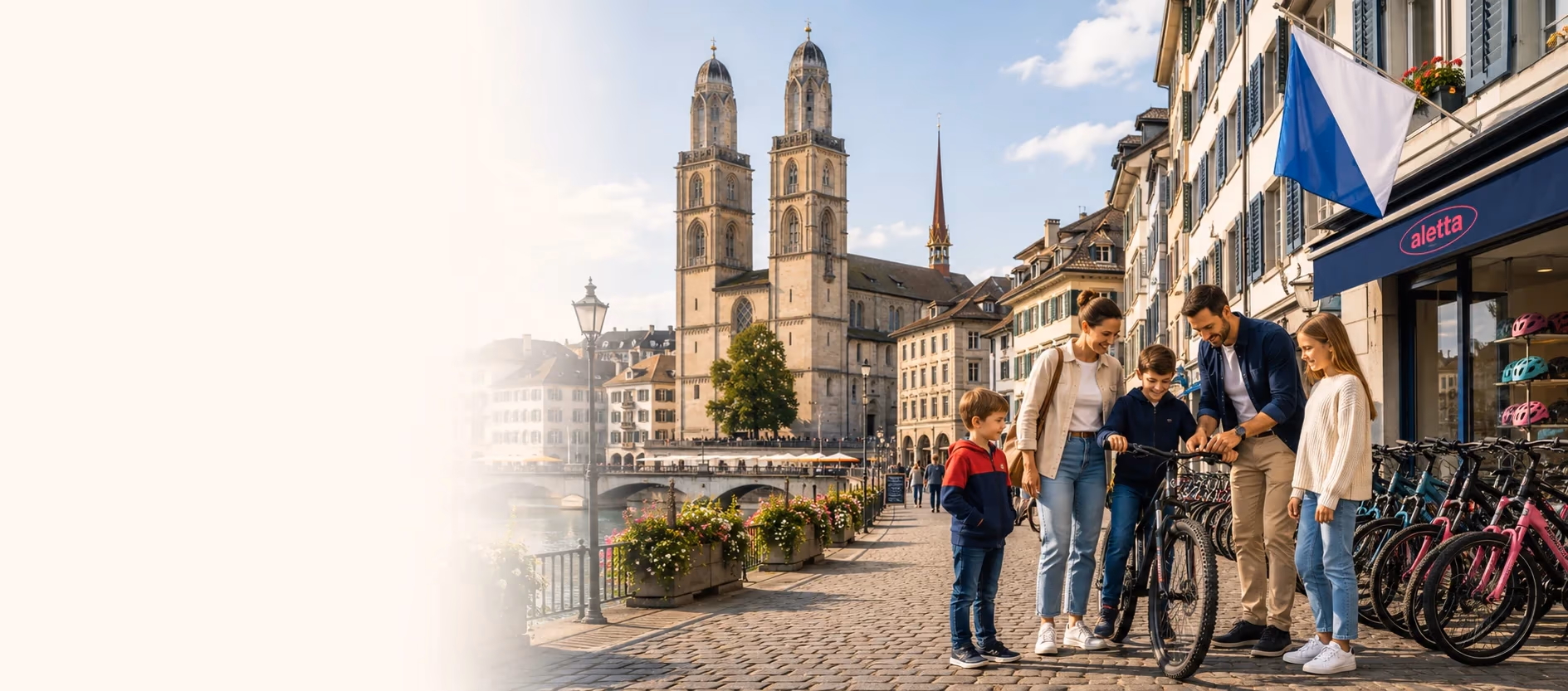 Familie vor einem Veloladen an der Limmat in Zürich, im Hintergrund das Grossmünster