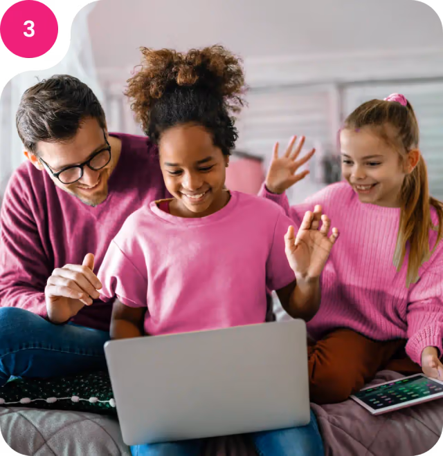 Step 3: Father and two daughters celebrating at a laptop